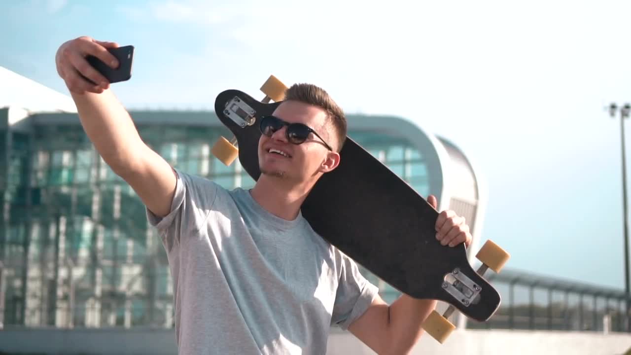 Free Video Stock Smiling Skater Takes Selfie For Social Media Live Wallpaper - Free Download