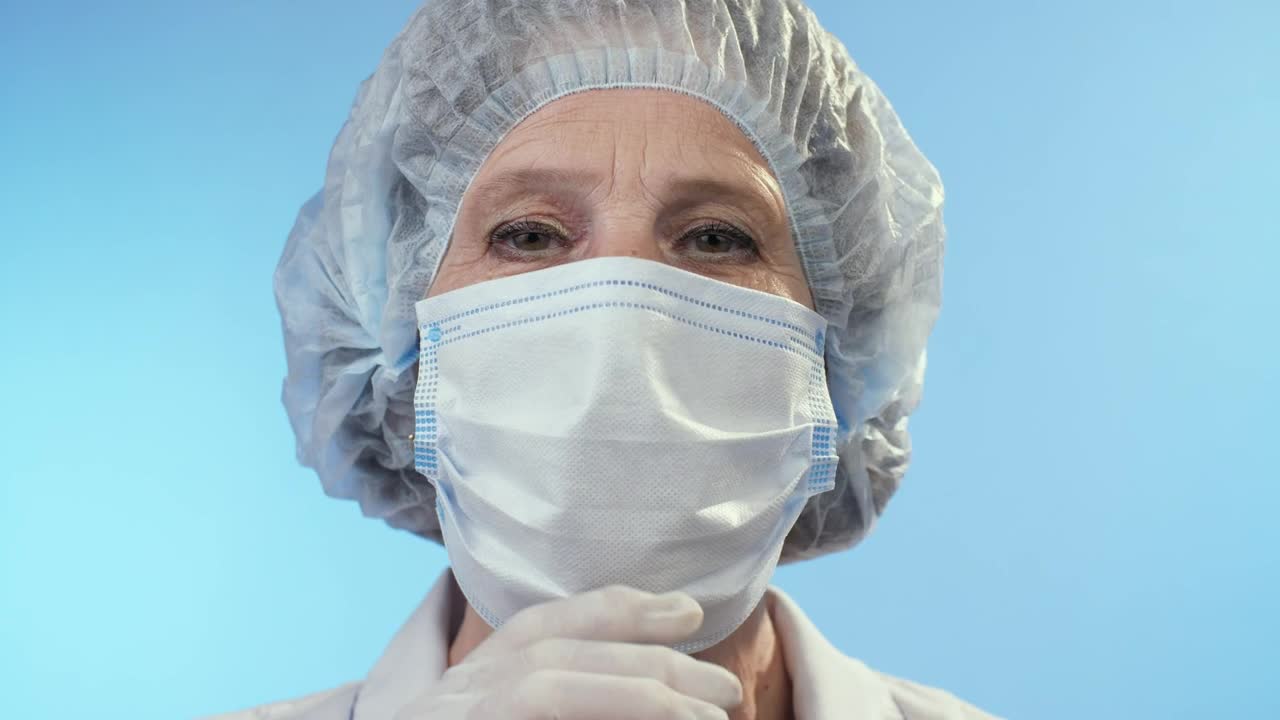 Stock Video Happy Doctor Takes Off The Mask Animated Wallpaper - Free Download