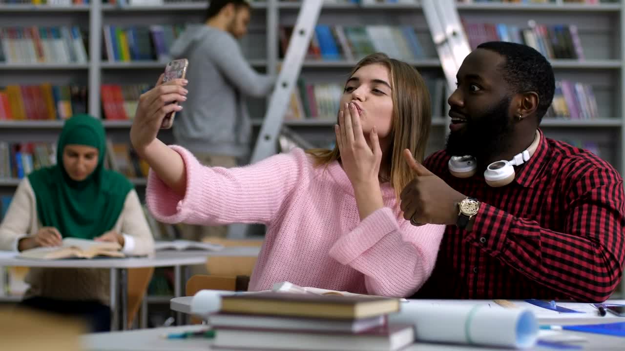 Free Video Stock Students Taking A Photo Instead Of Working Live Wallpaper - Free Download
