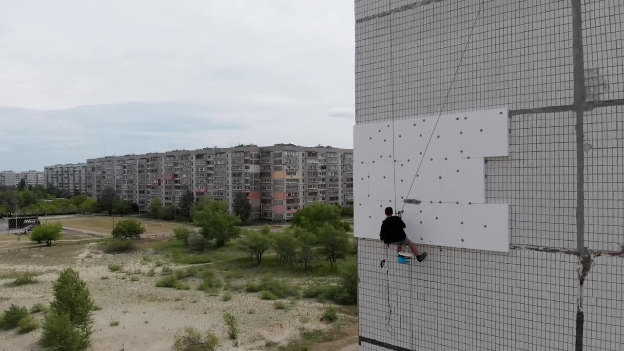 Video Stock Climber Working On A Building Live Wallpaper For PC - Free Download