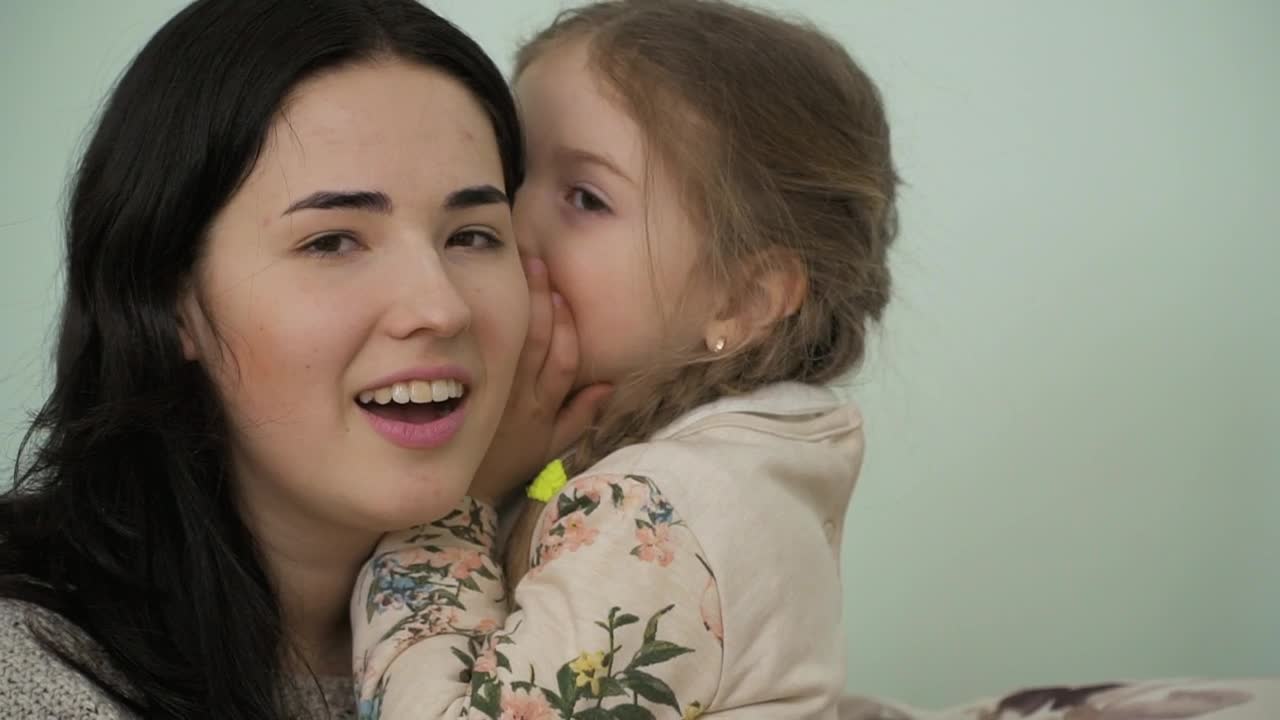 Stock Video Little Girl Gossips In Moms Ear Animated Wallpaper - Free Download