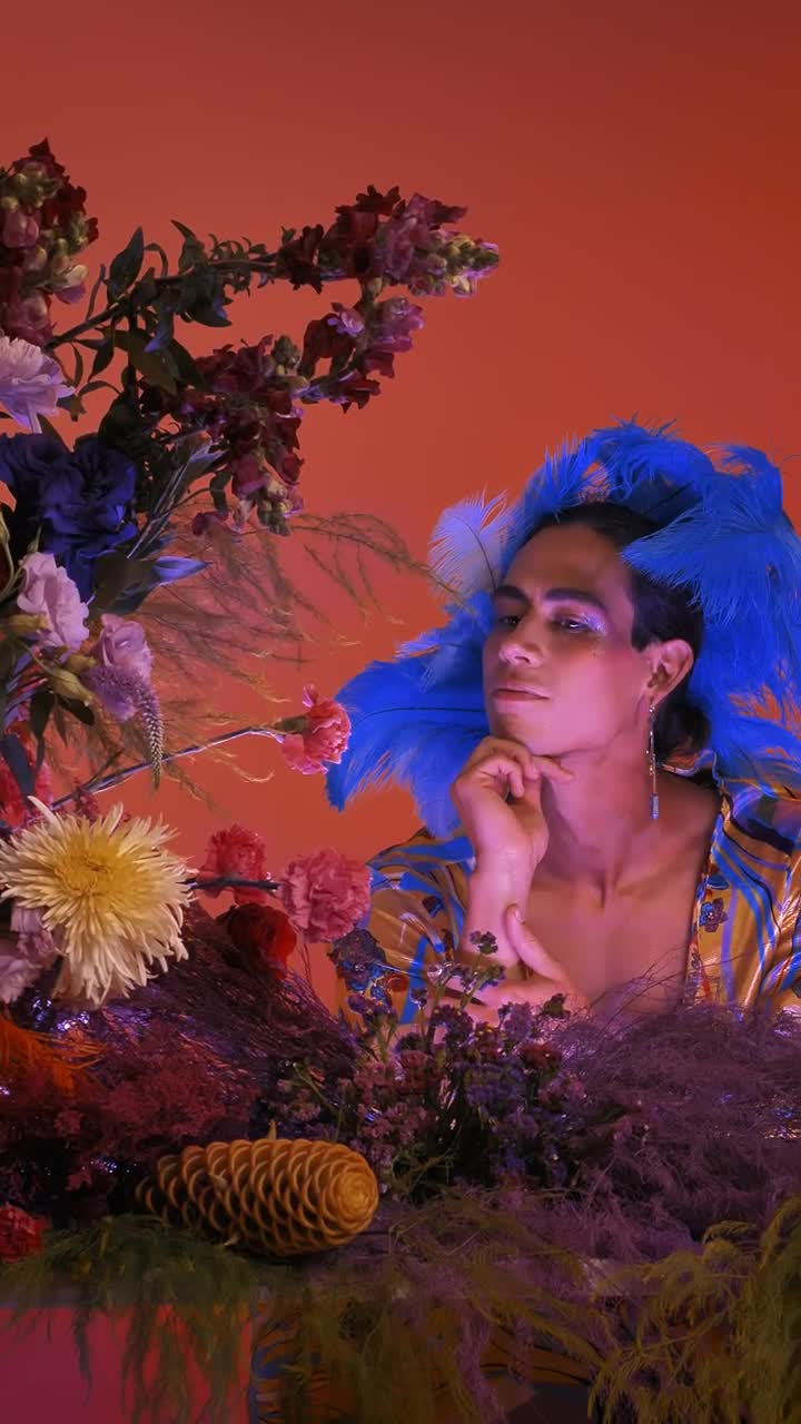 Stock Video Gay Boy Dressed And Made Up Extravagantly Among Flowers Live Wallpaper For PC - Free Download