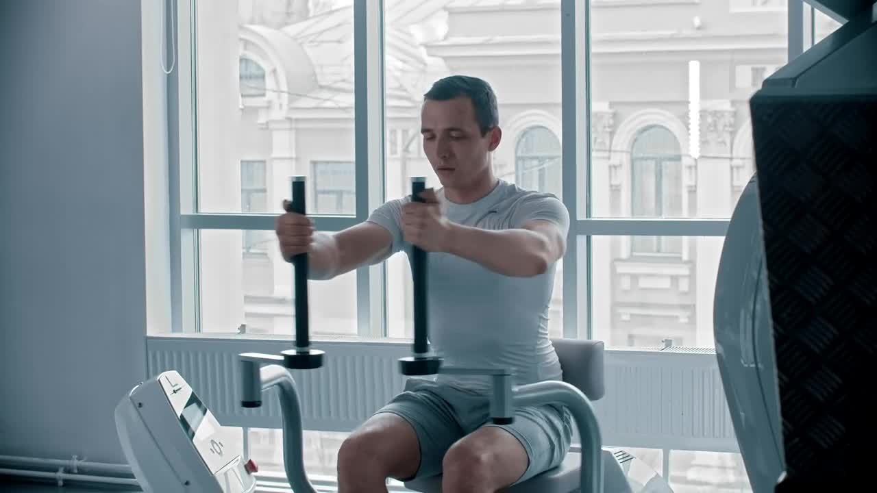 Stock Video Man Doing Chest Exercise At A White Gym Animated Wallpaper - Free Download