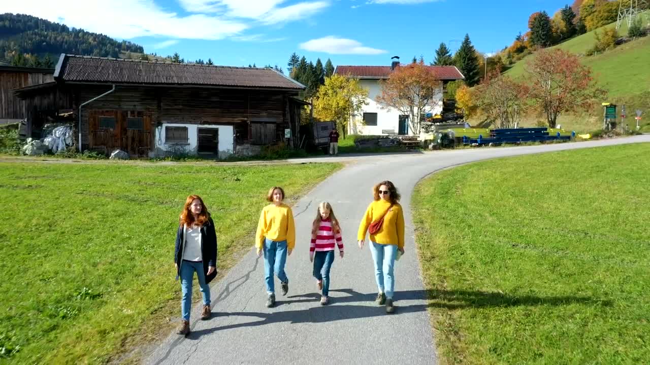 Stock Video Group Of Girls Walking Down The Road In The Alps Live Wallpaper For PC - Free Download
