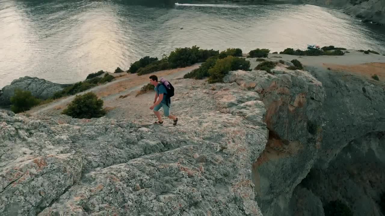 Stock Video Exploring Rocky Shoreline And Looking At Horizon Live Wallpaper For PC - Free Download