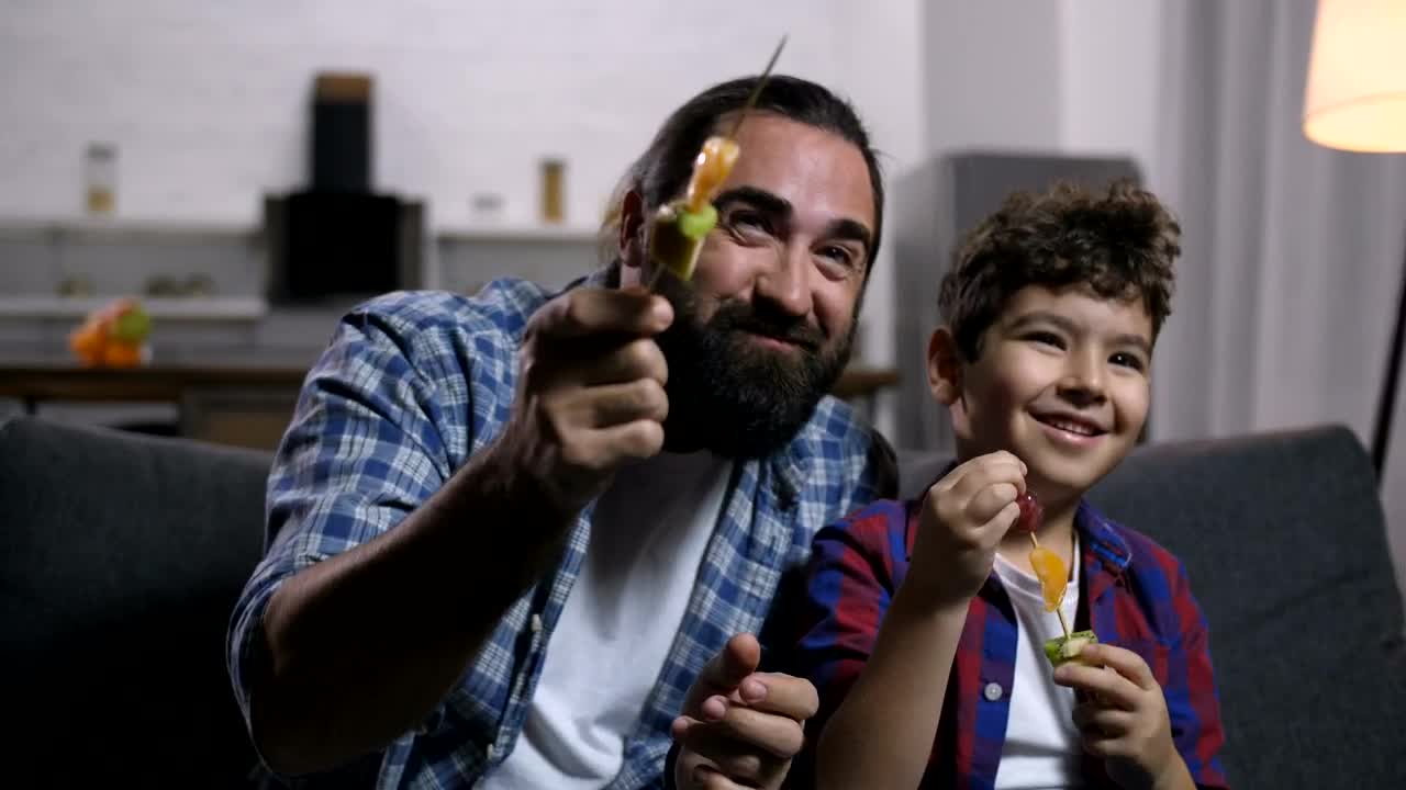 Stock Video Father And Son Enjoying A Snack Live Wallpaper For PC - Free Download