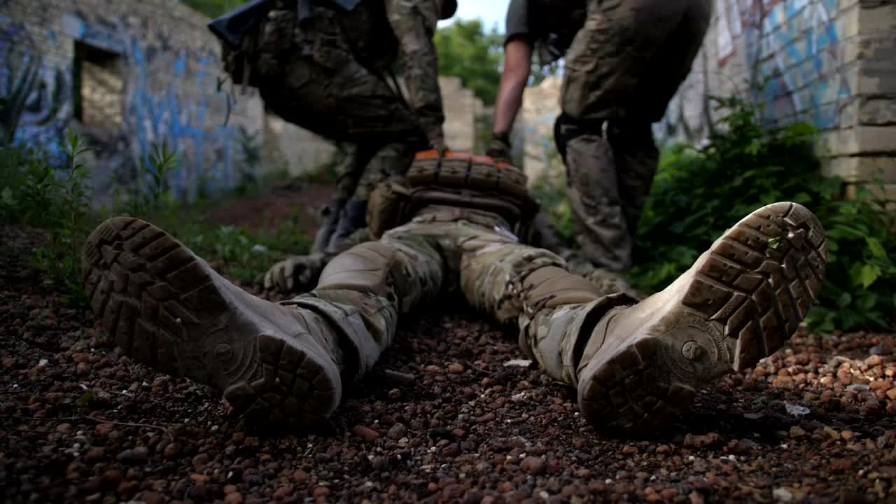 Free Video Stock Soldiers Drag A Wounded Man Live Wallpaper - Free Download