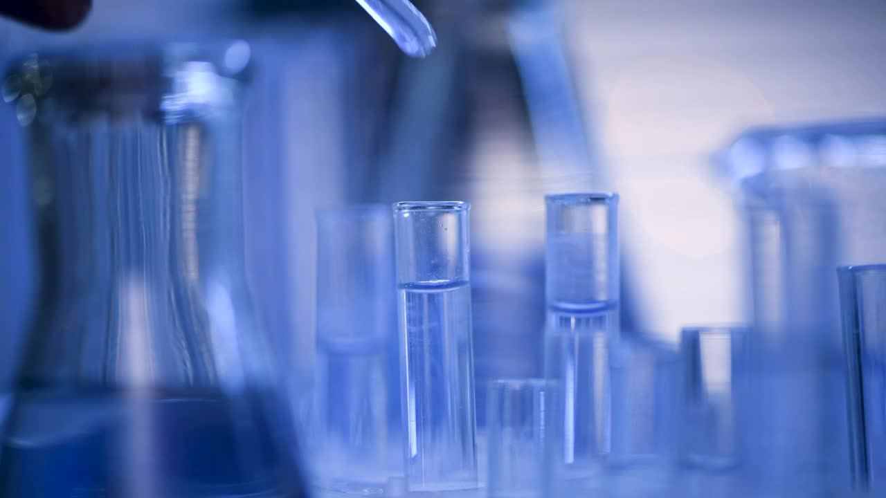 Stock Footage Water Dropper And Lab Tubes Live Wallpaper - Free Download