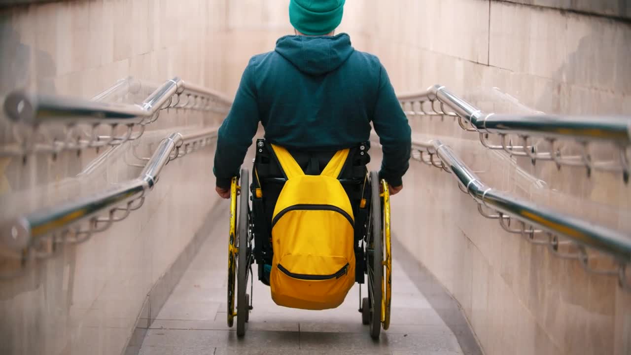 Stock Video Disabled Man In A Wheelchair Getting Down The Special Ramp Live Wallpaper For PC - Free Download