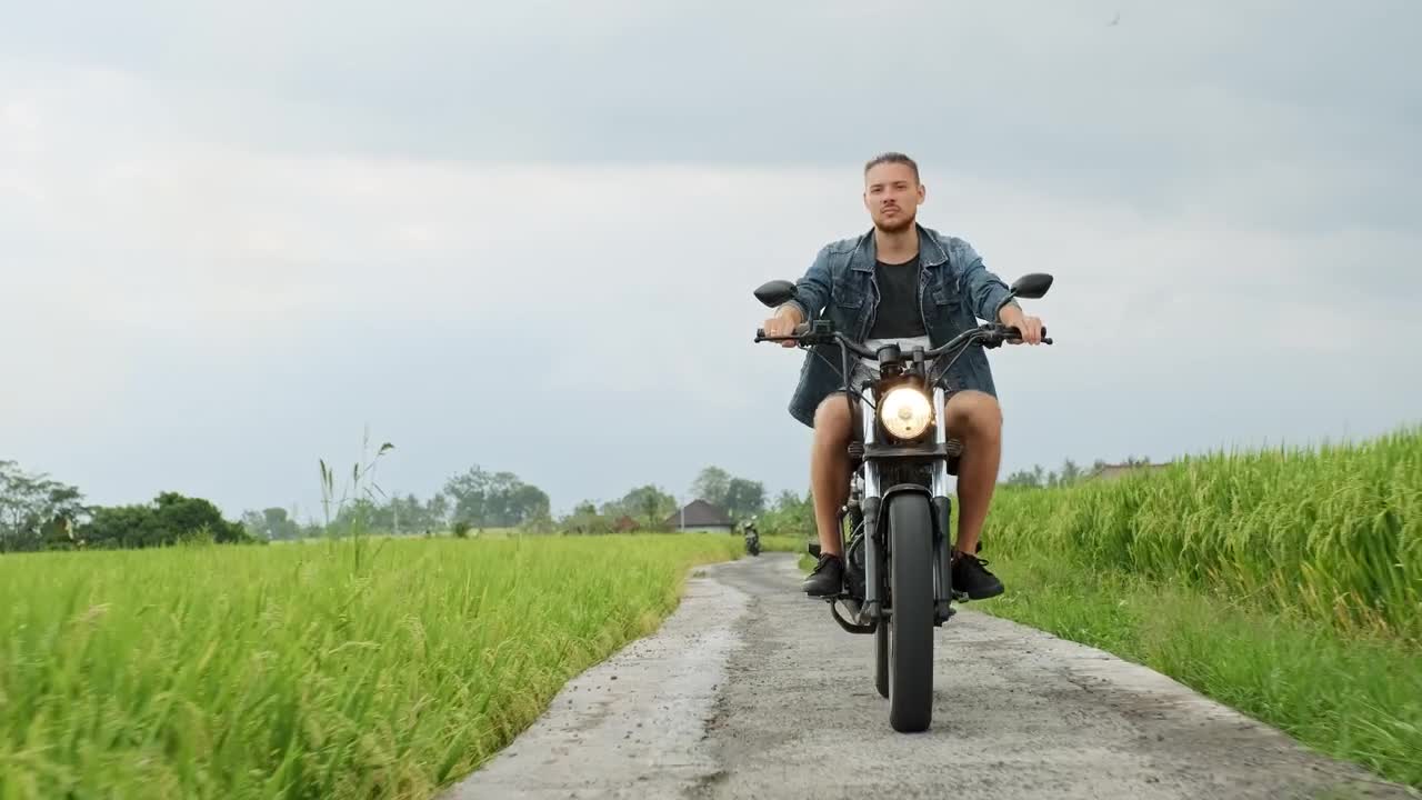 Stock Video Man Rides Motorcycle Chopper On Farm Field Pat Animated Wallpaper - Free Download