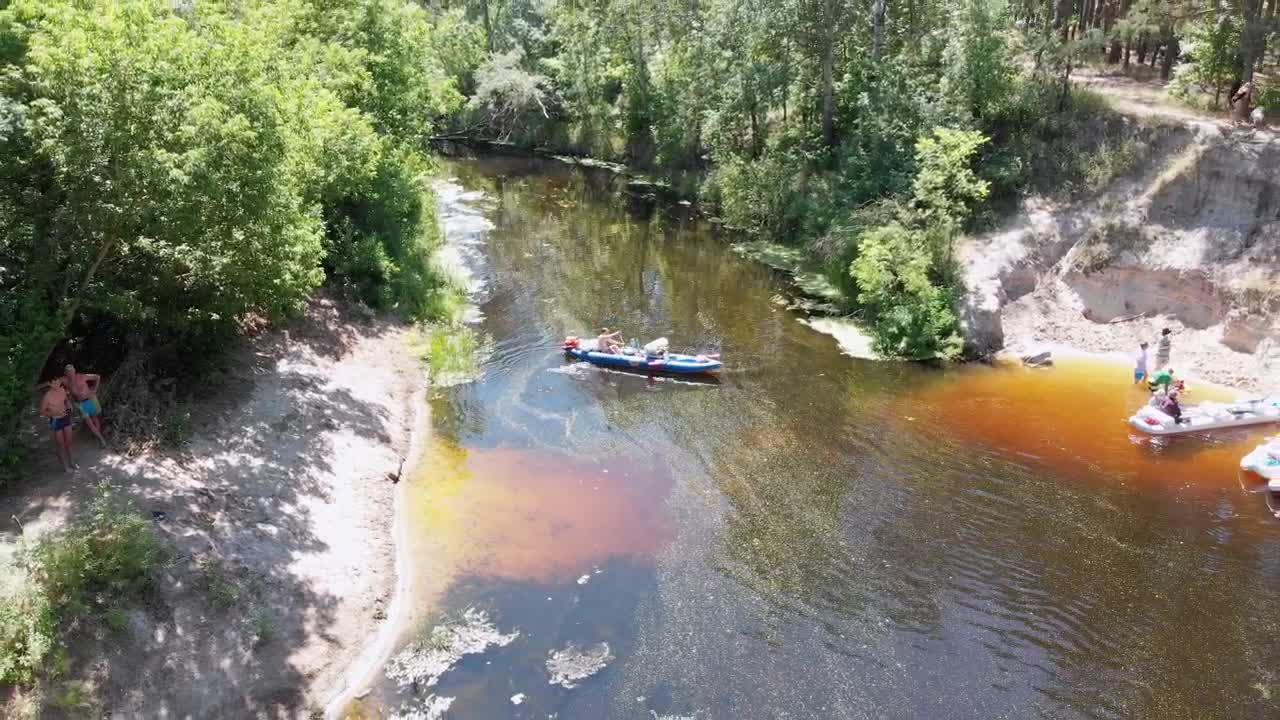Stock Video People Kayaking Along A River Aerial Shot Live Wallpaper - Free Download