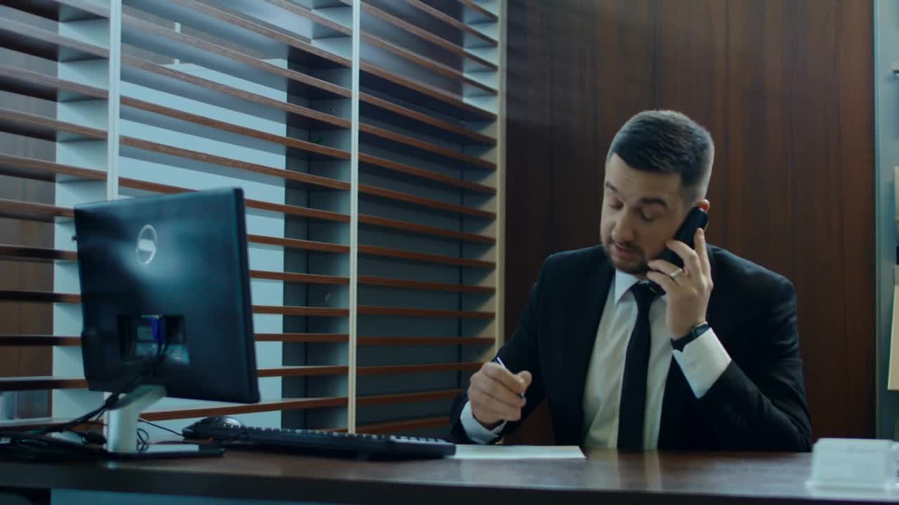 Stock Video Man On A Phone Call At His Des Animated Wallpaper - Free Download