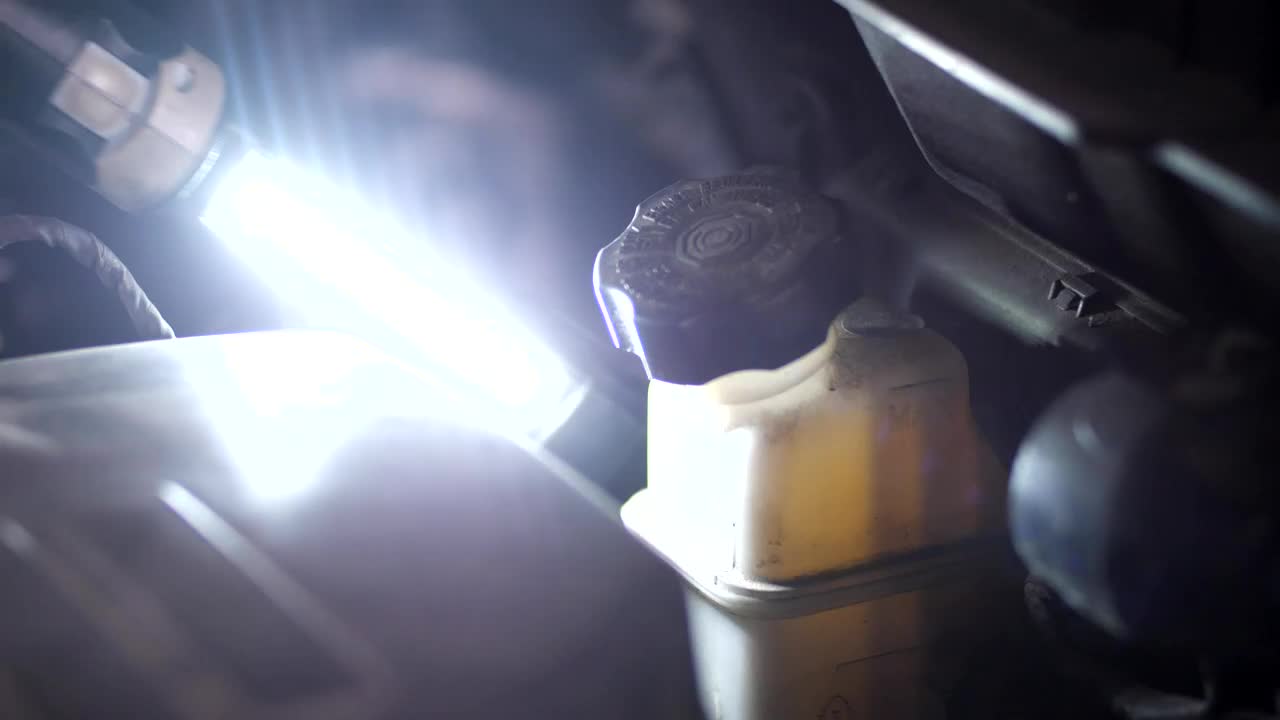 Stock Video Mechanic Working On An Engin Animated Wallpaper - Free Download