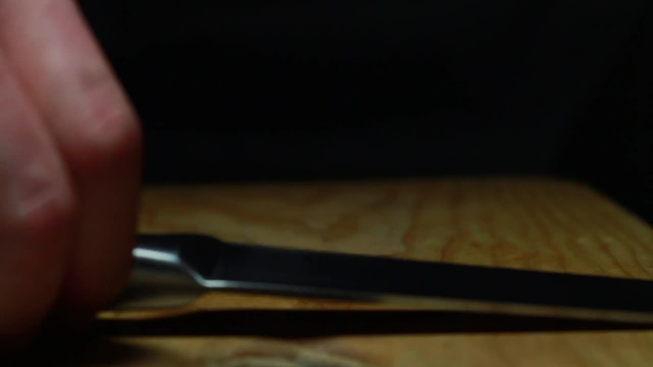 Free Video Stock Slicing A Tomato Over A Chopping Board Live Wallpaper - Free Download