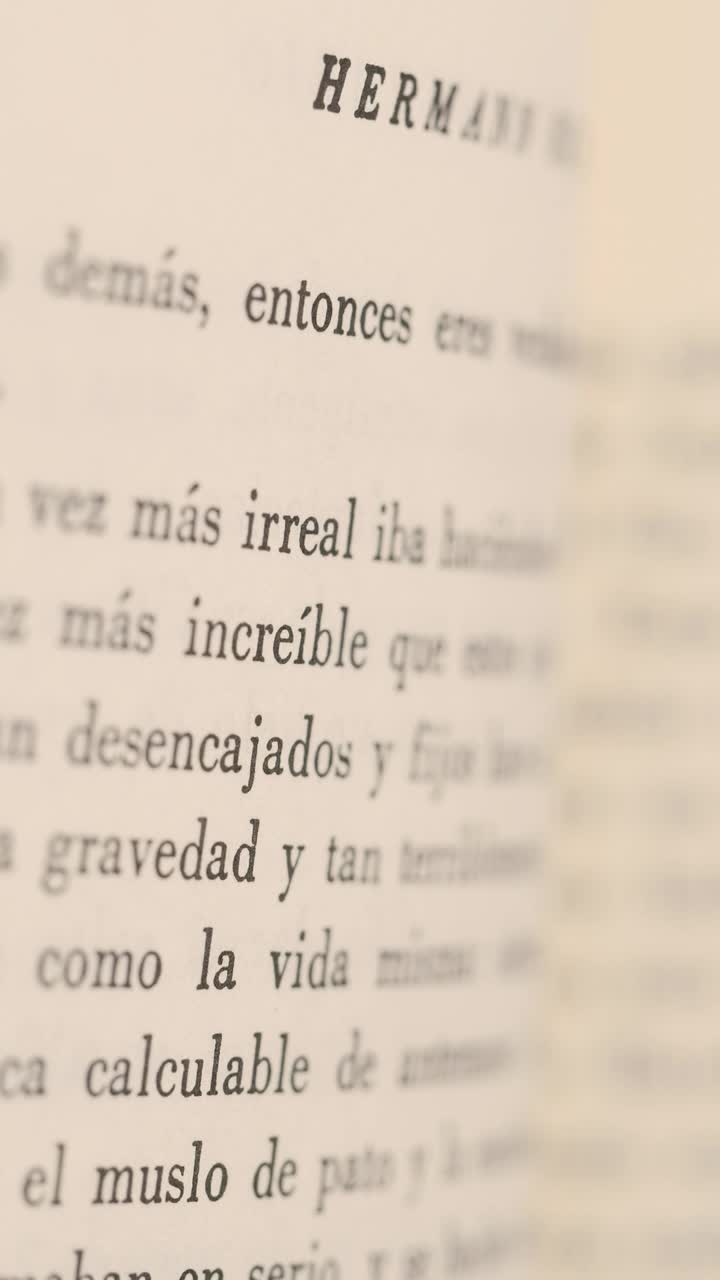 Stock Video Pages Of A Book Viewed Up Close While Shifting Focus Live Wallpaper - Free Download