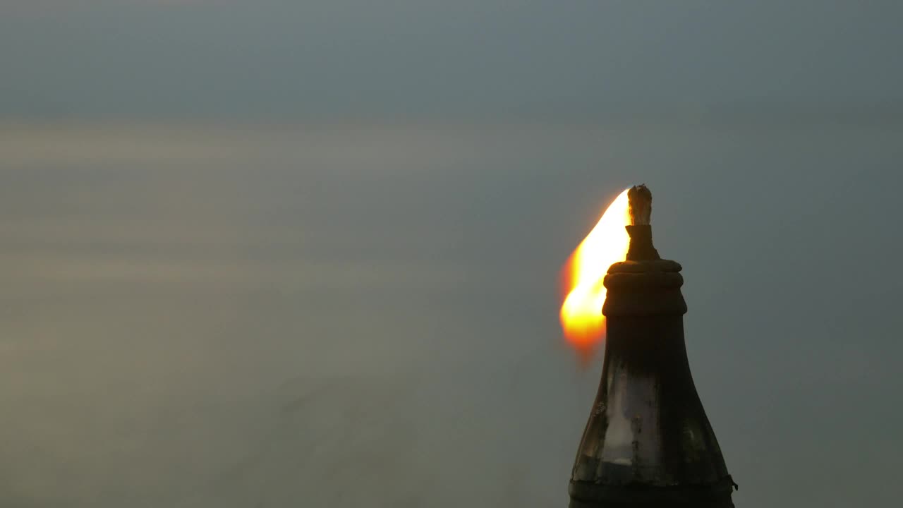 Free Video Stock torch burning in the evening Live Wallpaper - Free Download