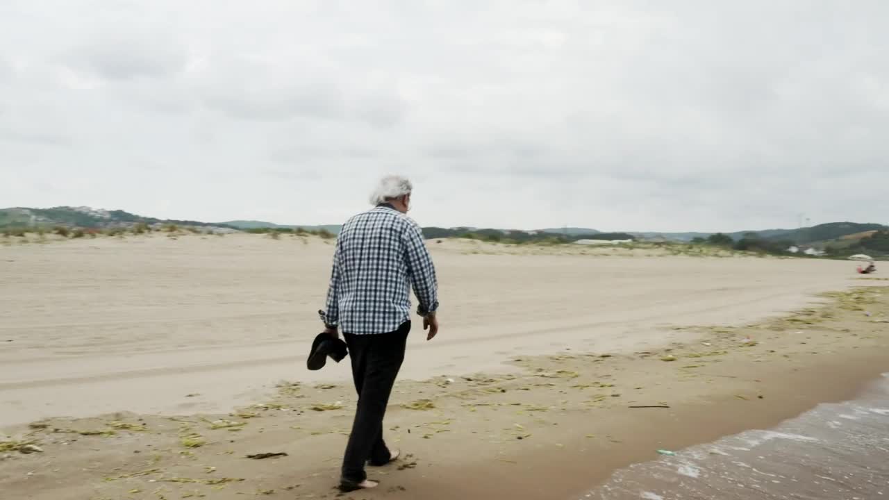 Stock Video Old Man Walking By The Shore Live Wallpaper - Free Download