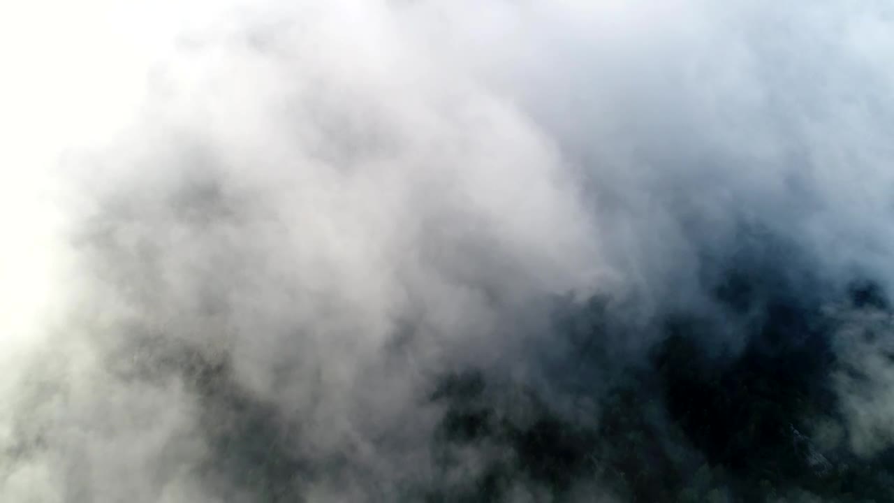 Free Video Stock thick clouds over a mountain Live Wallpaper - Free Download
