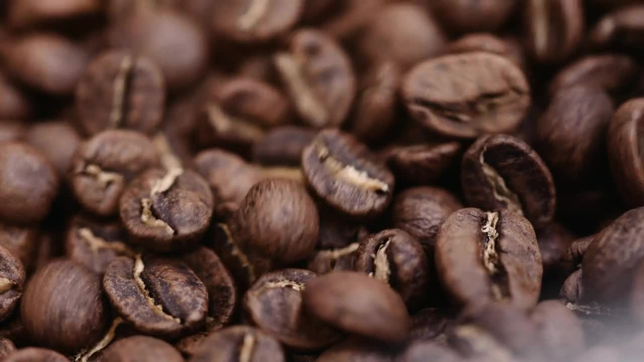 Stock Video Macro Shot Of Roasted Coffee Beans Moving Animated Wallpaper - Free Download
