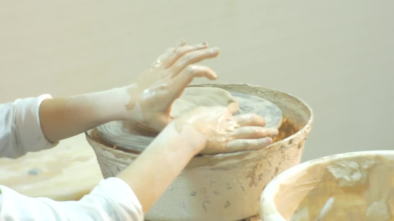 Stock Video Kid Working With Clay On A Pottery Wheel Animated Wallpaper - Free Download