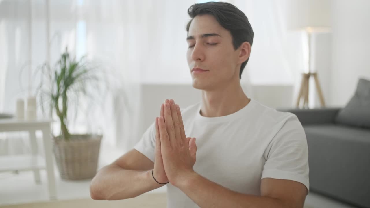 Video Stock Closeup Of Man In Namaste Yoga Pose In Living Room Live Wallpaper For PC - Free Download