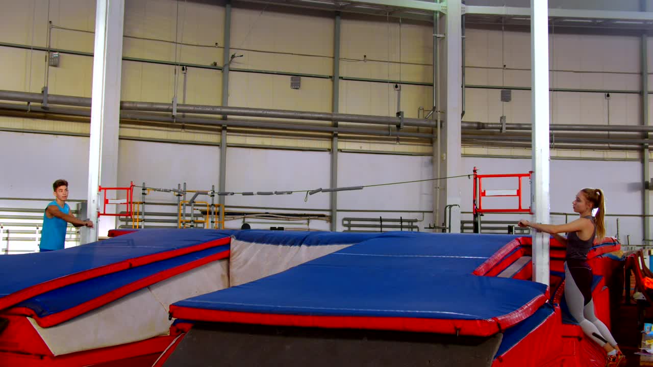 Free Stock Video Two Athletes Placing Pole Vault Rope Live Wallpaper - Free Download