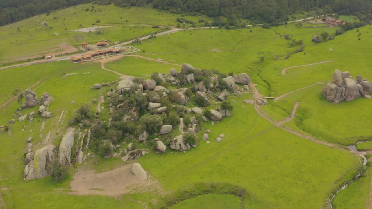Stock Video Cluster Of Rocks In The Center Of A Huge Meadow Live Wallpaper For PC - Free Download
