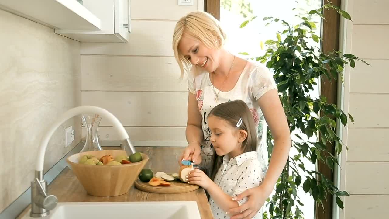 Stock Video Mother Teaches Her Daughter To Make A Sala Animated Wallpaper - Free Download