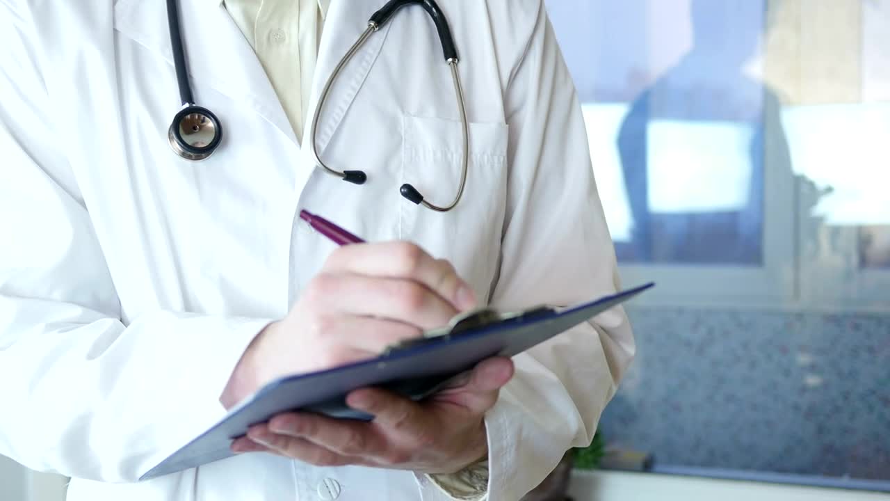 Stock Video Doctor Writing On A Medical Record Live Wallpaper For PC - Free Download