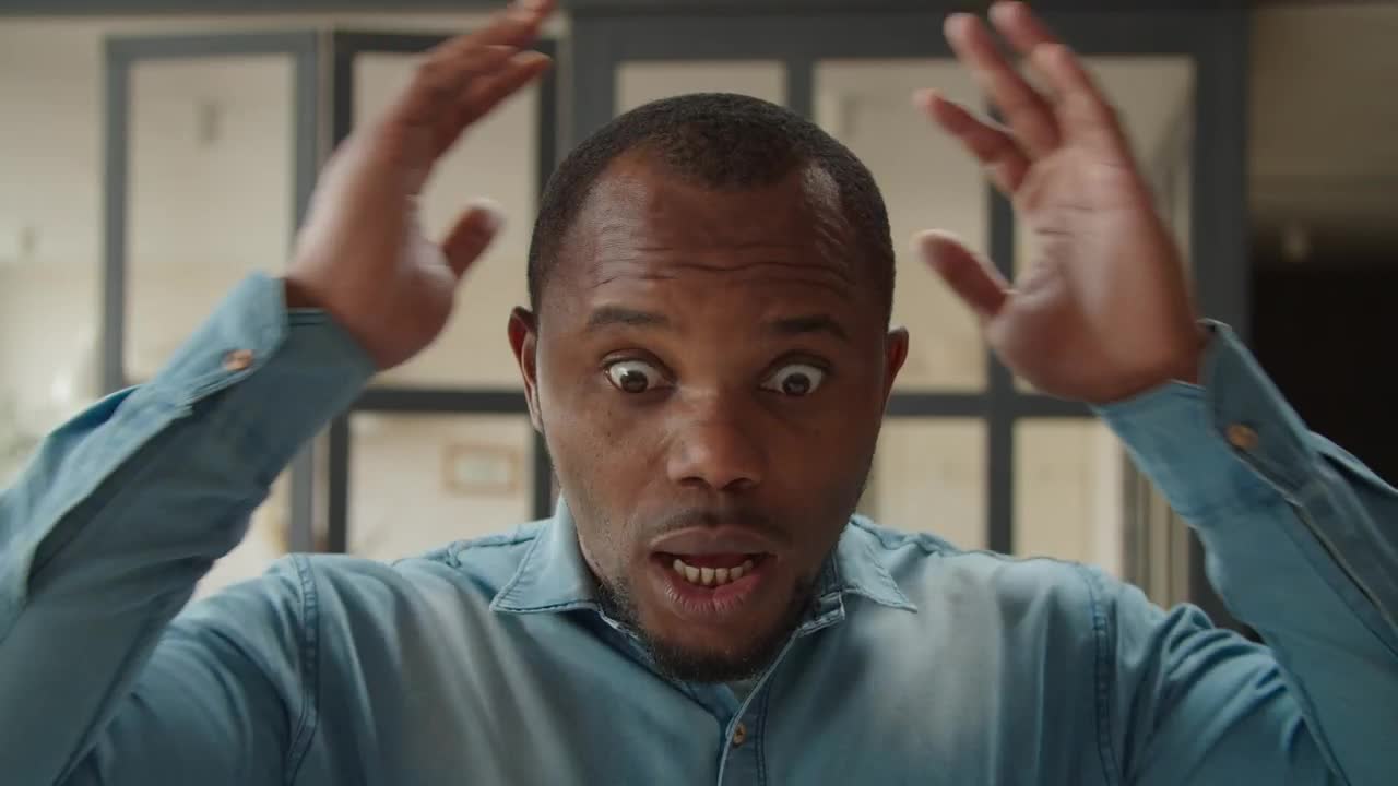 Free Video Stock surprised man with hands on head Live Wallpaper - Free Download