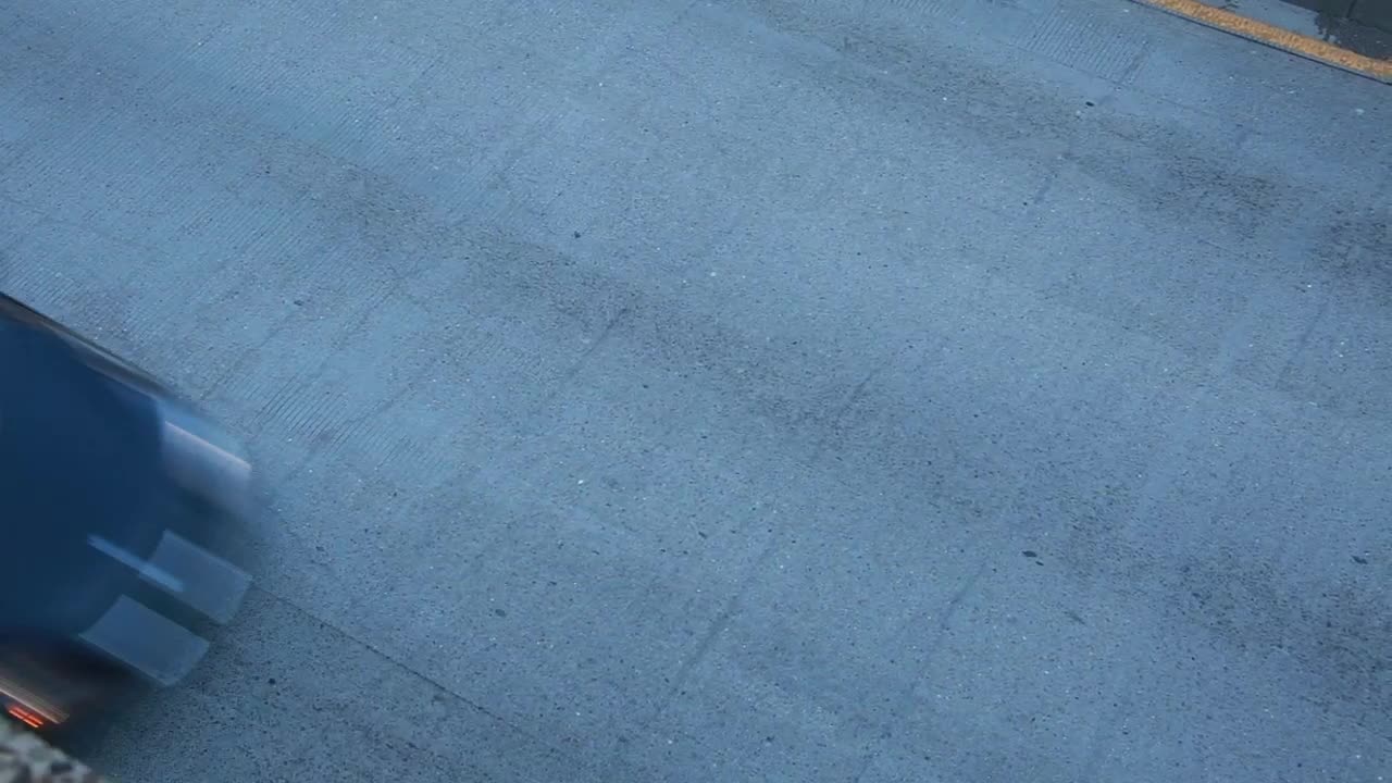 Video Stock Closeup Of Traffic Driving Quickly Live Wallpaper For PC - Free Download