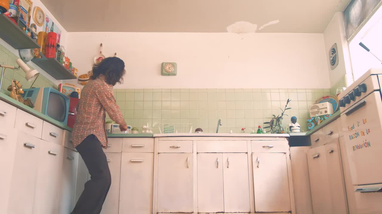 Stock Video Man Dancing In A Retro Kitchen Animated Wallpaper - Free Download