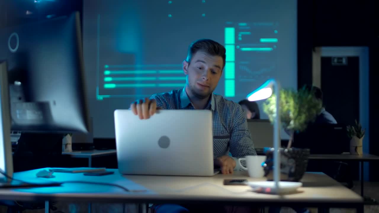Stock Video Man Fed Up With Work In The Office Drinks Coffee Animated Wallpaper - Free Download