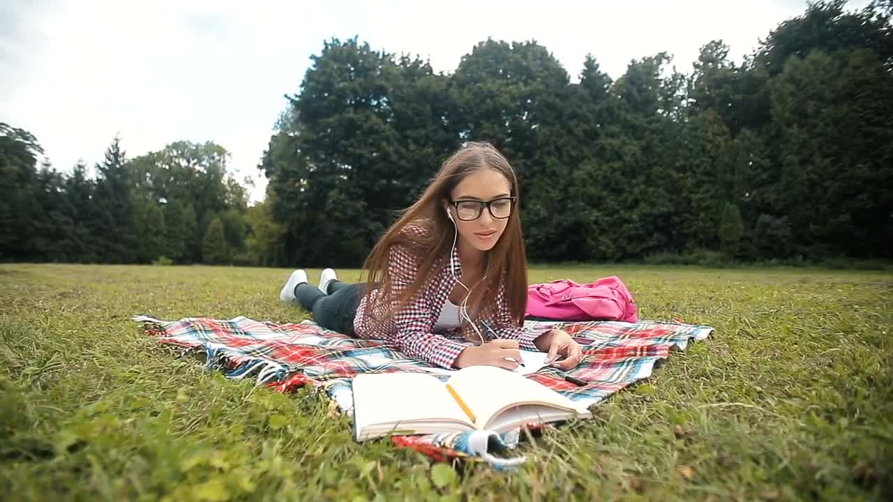 Stock Video Distance Education Student Listens To Lecture In Park Live Wallpaper For PC - Free Download