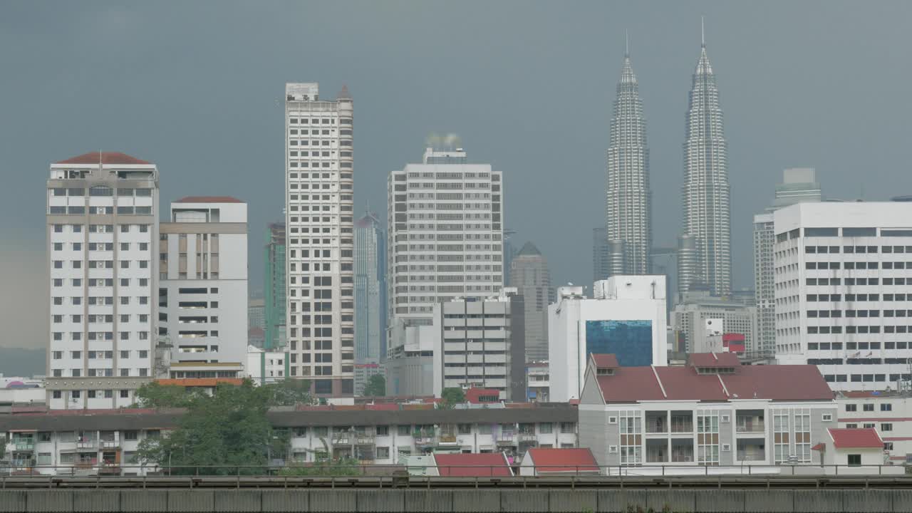 Free Video Stock train heading across the city in kuala lumpur Live Wallpaper - Free Download