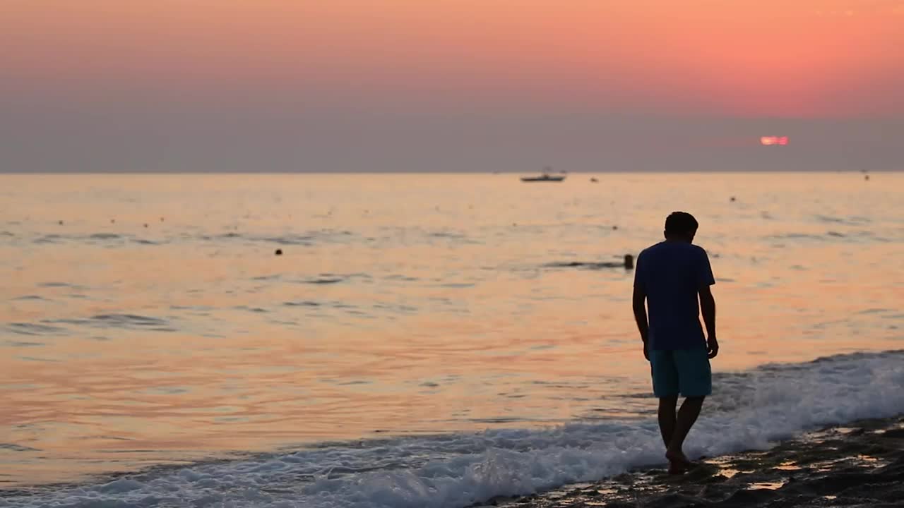 Stock Video Depressed Man In The Seashore At Sunset Live Wallpaper For PC - Free Download