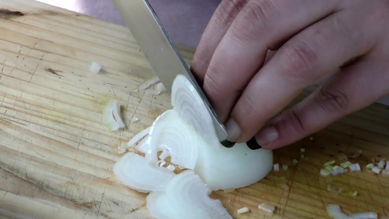 Stock Video Cutting Onion Into Slices On A Board Live Wallpaper For PC - Free Download