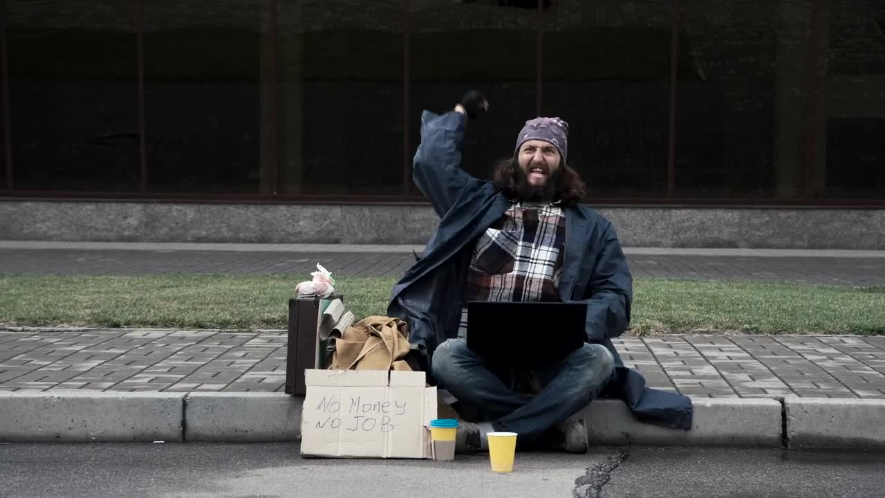 Stock Video Happy Homeless With Laptop Celebrating Animated Wallpaper - Free Download