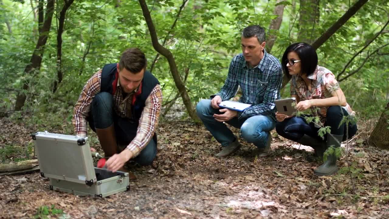 Free Stock Video Scientists Picking Up Ground Samples Live Wallpaper - Free Download