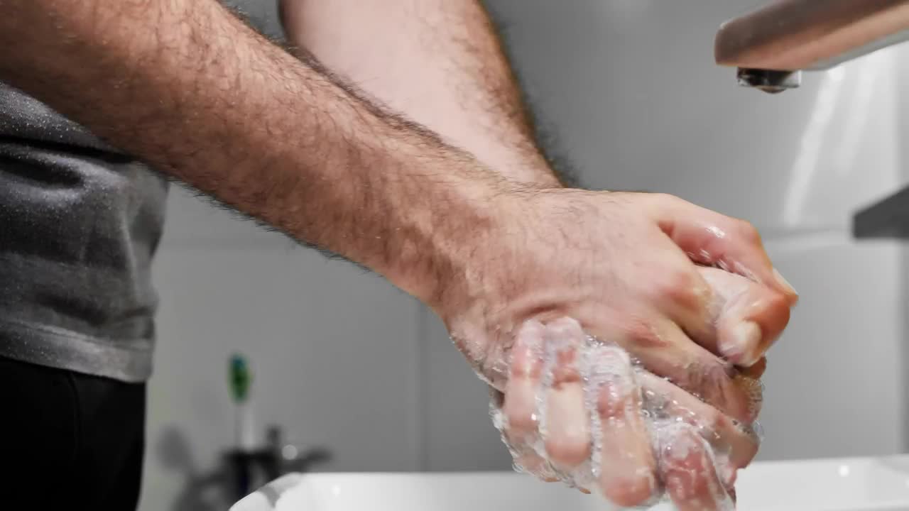 Stock Video Man Washing His Hands With Soap Detailed Vie Animated Wallpaper - Free Download
