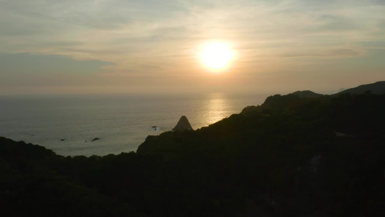 Free Video Stock sunset at sea seen from the top of a coast Live Wallpaper - Free Download