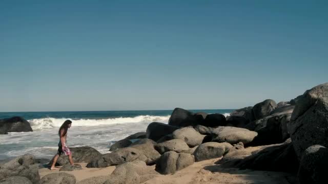 Stock Video Man Walking On Large Boulders Sma Animated Wallpaper - Free Download