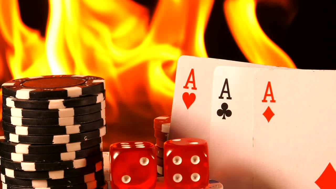 Stock Video Fire Burning Behind Poker Cards Dice And Casino Chips Live Wallpaper For PC - Free Download