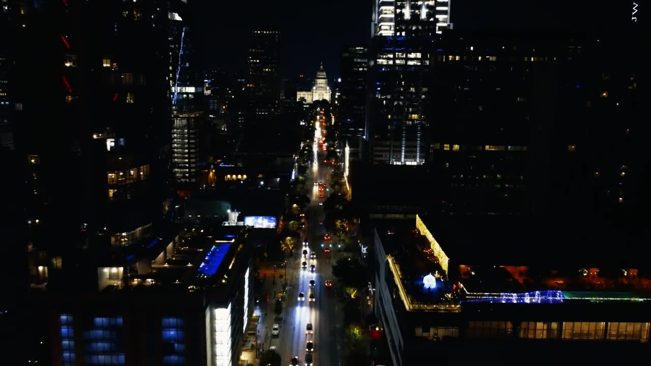 Stock Video Flying Over A Large Avenue In A City At Night Live Wallpaper For PC - Free Download