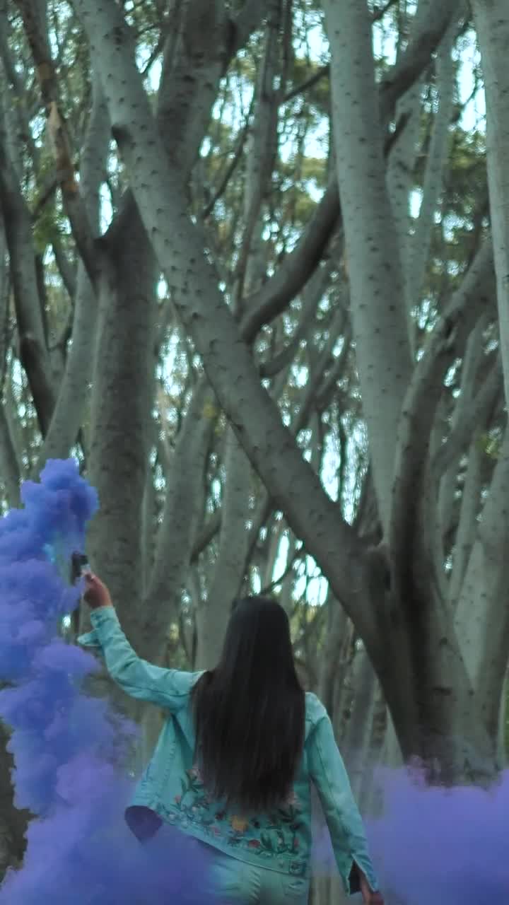 Stock Footage Urban Woman With A Smoke Bomb At A Forest Live Wallpaper - Free Download