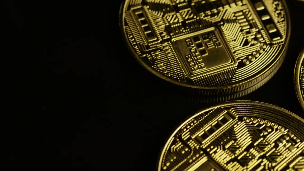 Stock Video Bitcoins Coins Rotating Slow On A Black Surface Live Wallpaper For PC - Free Download