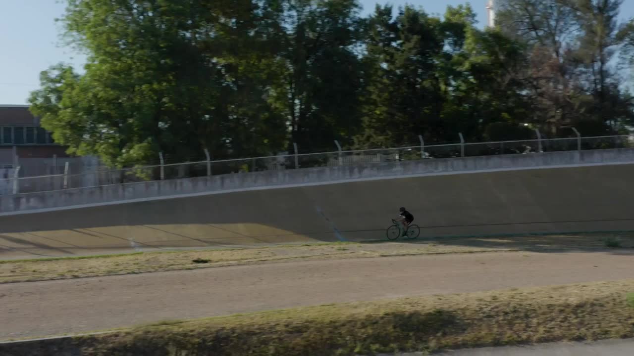 Stock Video Cyclist Traveling On A Track Outside Live Wallpaper For PC - Free Download