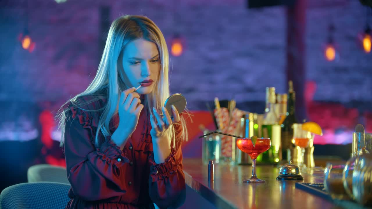 Stock Video Girl Putting On Makeup Sitting At A Bar Live Wallpaper For PC - Free Download