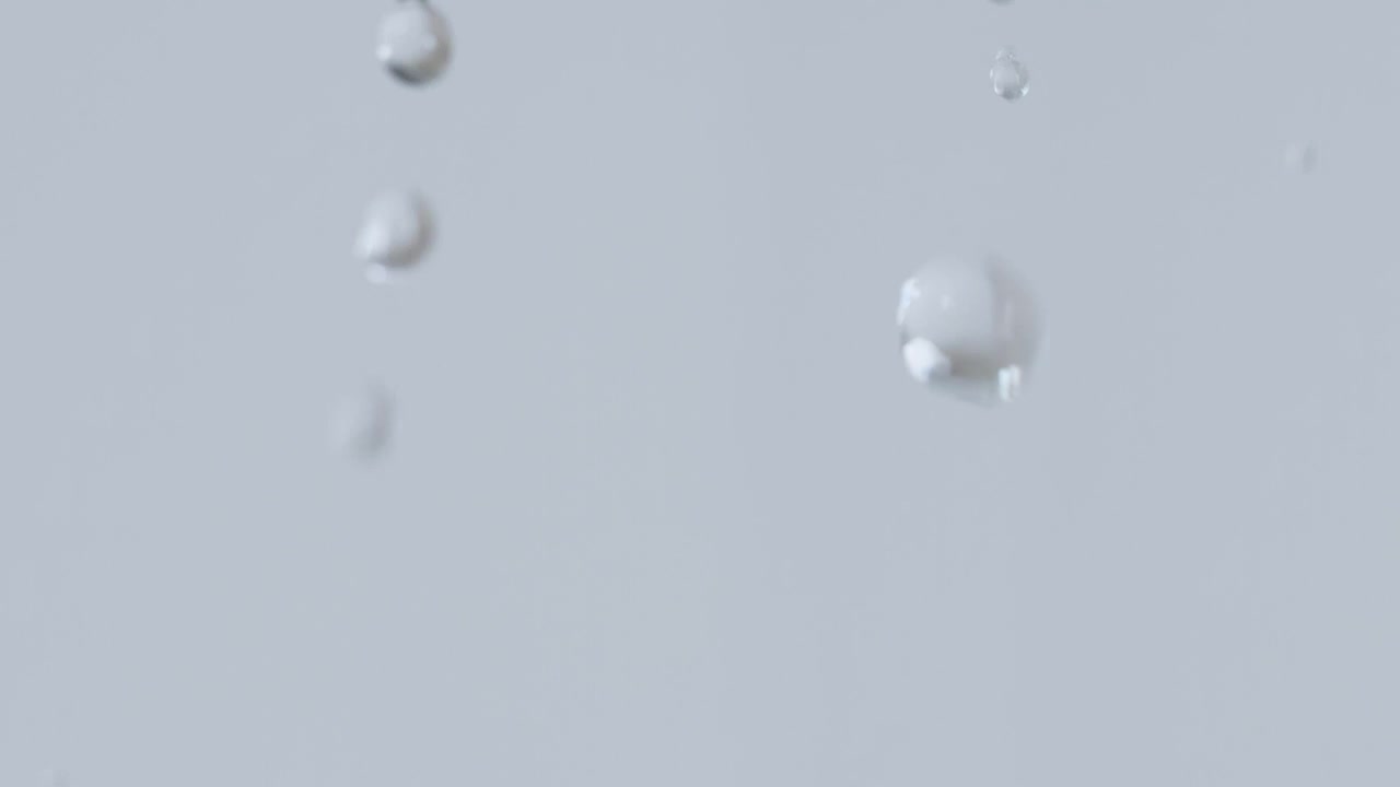 Stock Video Drops Of Water Falling On A Gray Background Live Wallpaper For PC - Free Download
