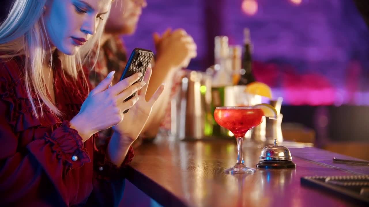 Free Stock Video Woman Taking A Picture Of Her Drinking In A Bar Live Wallpaper - Free Download